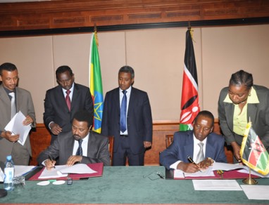Hon. Kimunya signs Transport Services Agreement